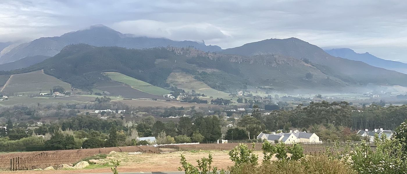 The Franschhoek valley, vineyards and wine estates ringed by mountains